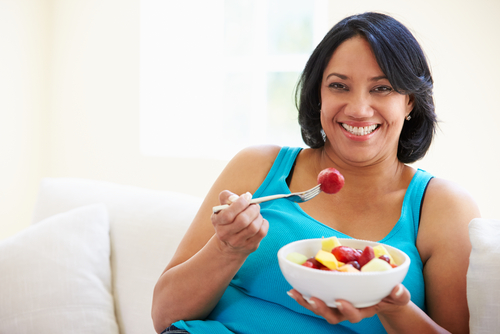 Women Eating Fruit